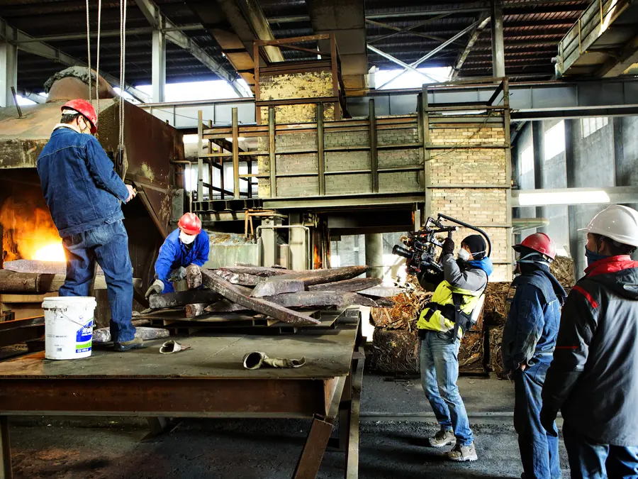 China fixer supporting an industrial film production